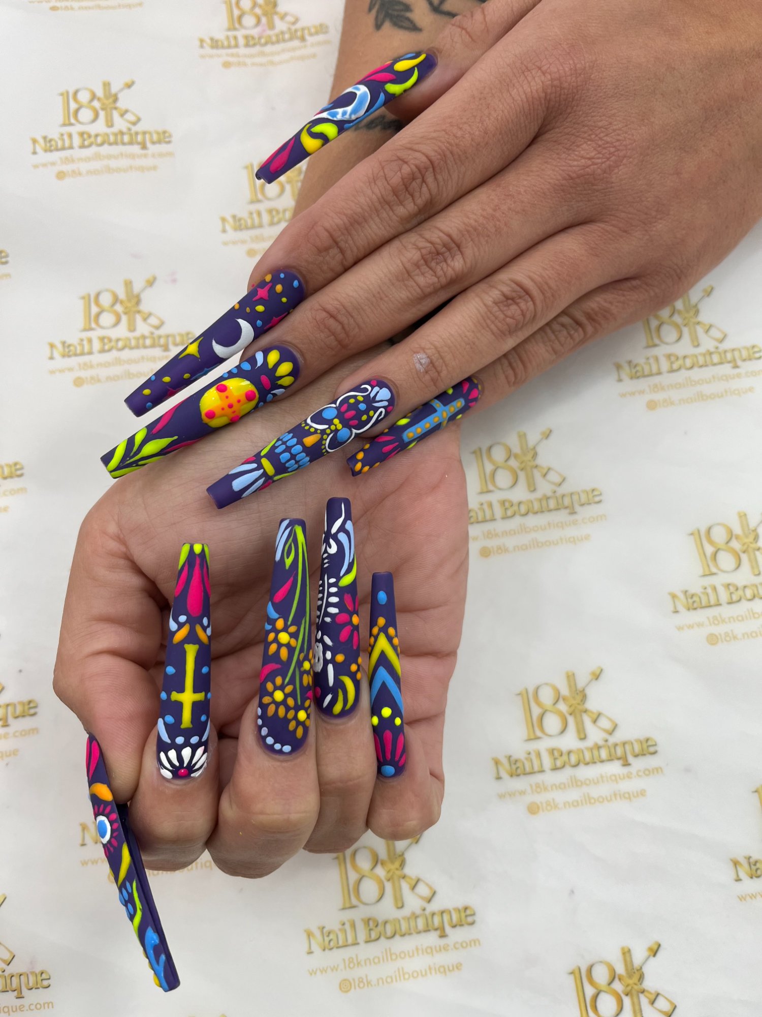 Colorful folk art nail design