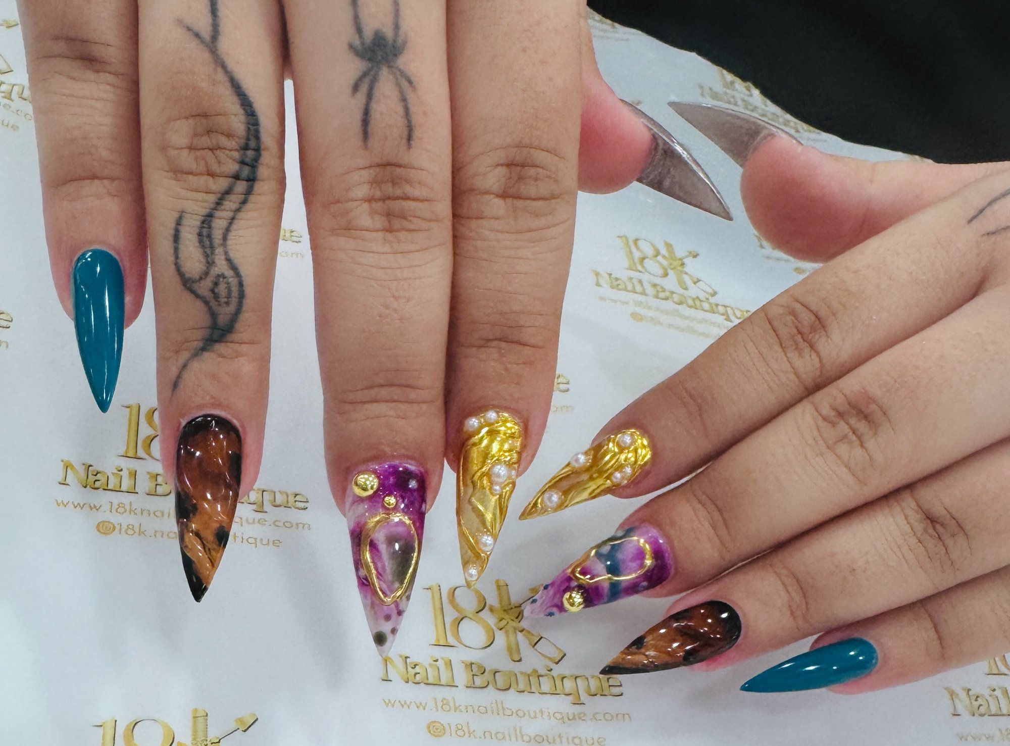 Teal and gold 3D nail art